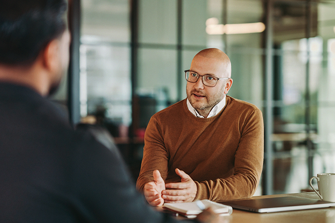 Legal adviser talking to a professional