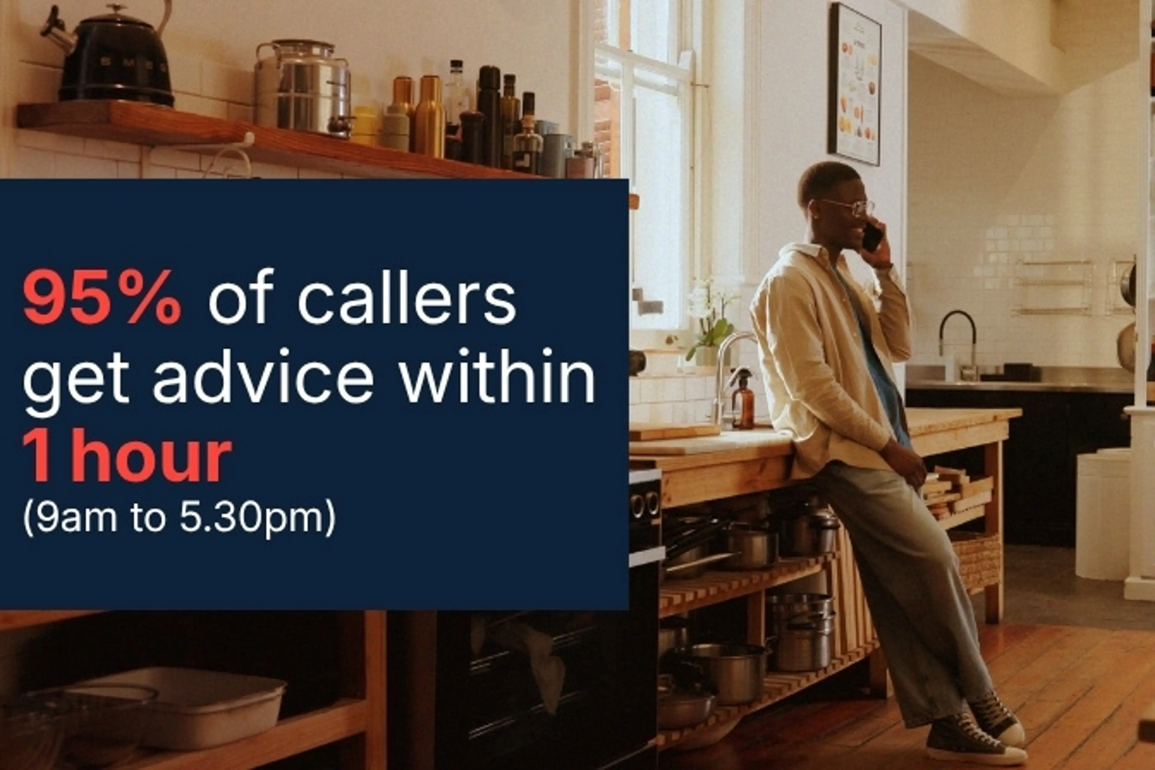 Man on phone in kitchen