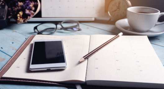 Image showing a phone on top of a diary